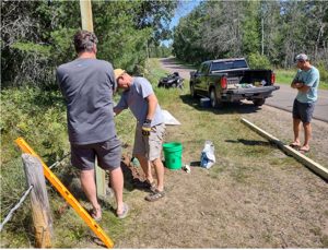 Installing the boat decontamination station at the Horseshoe Lake public landing, 2021