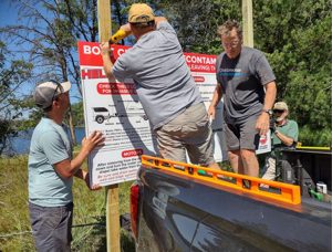 Installing the boat decontamination station at the Horseshoe Lake public landing, 2021