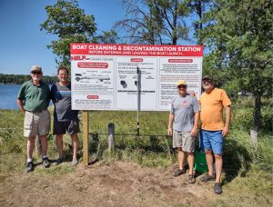 Installing the boat decontamination station at the Horseshoe Lake public landing, 2021
